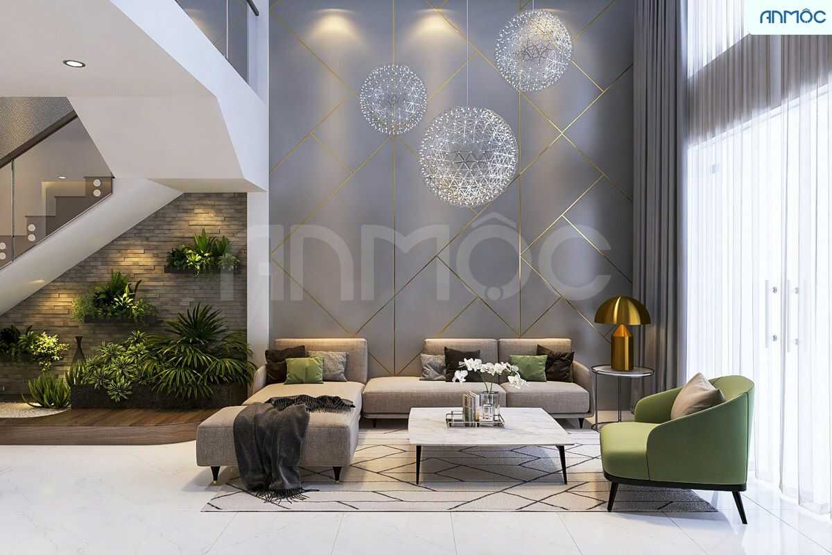 Căn phòng này được gia chủ lấy màu xám làm chủ đạo, sau đó kết hợp với màu xanh lá của bộ ghế và lùm cây phía sau tạo thêm điểm nhấn "xanh" cho căn phòng Căn phòng này được gia chủ lấy màu xám làm chủ đạo, sau đó kết hợp với màu xanh lá của bộ ghế và lùm cây phía sau tạo thêm điểm nhấn "xanh" cho căn phòng