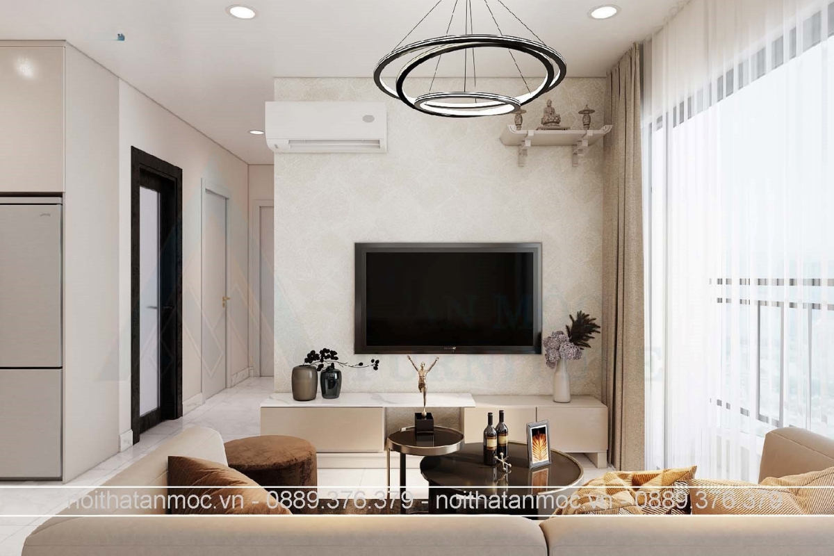 Thiết kế phòng khách hiện đại với kệ tivi tối giản, đèn chùm thả trần hình vòng tròn độc đáo và sofa nệm êm ái.