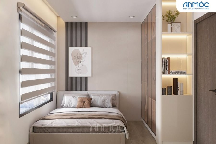Phòng ngủ nhỏ tông màu be và xám với giường đơn, kệ sách tích hợp tủ quần áo, tranh treo tường tối giản và rèm cầu vòng
