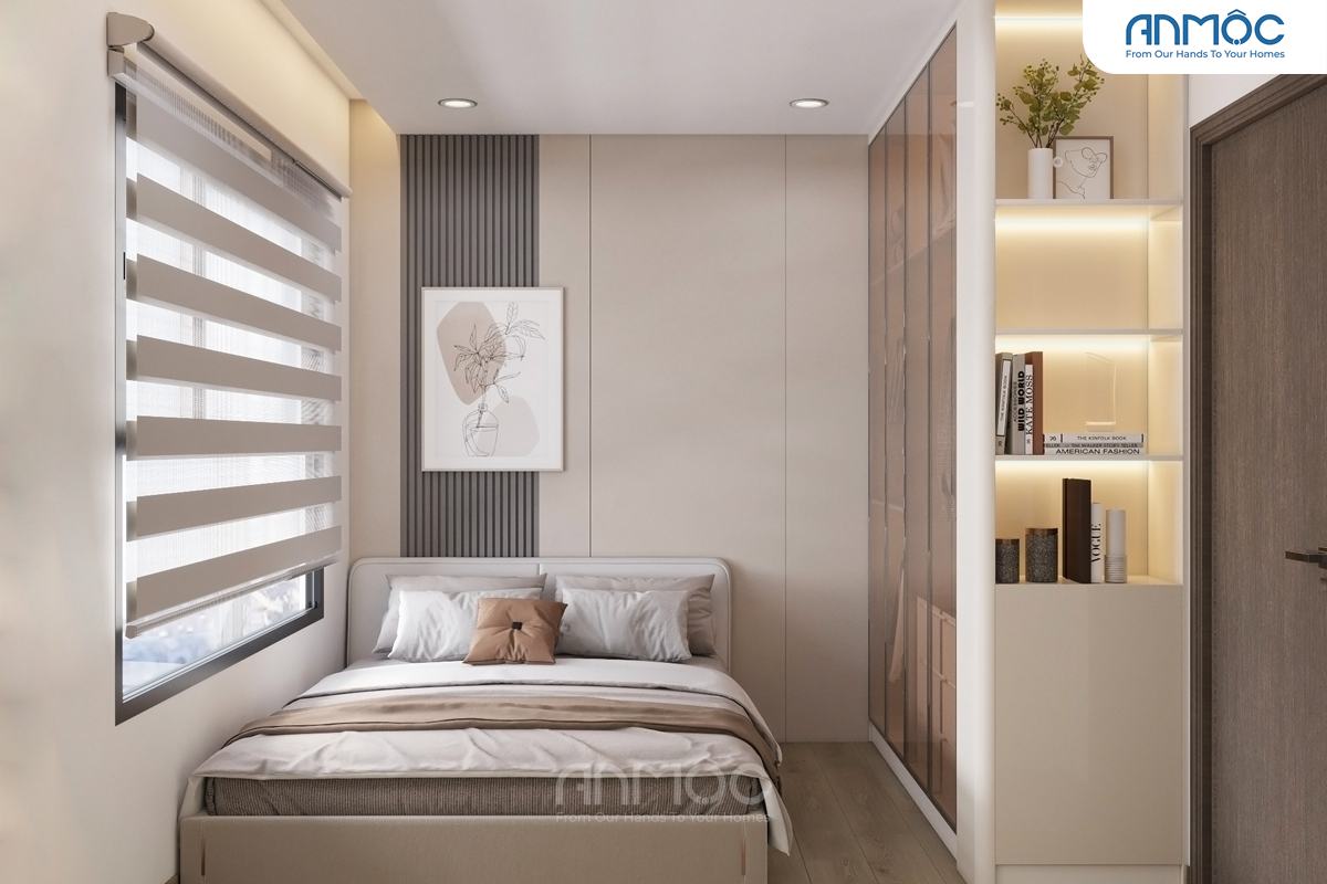 Phòng ngủ nhỏ tông màu be và xám với giường đơn, kệ sách tích hợp tủ quần áo, tranh treo tường tối giản và rèm cầu vòng