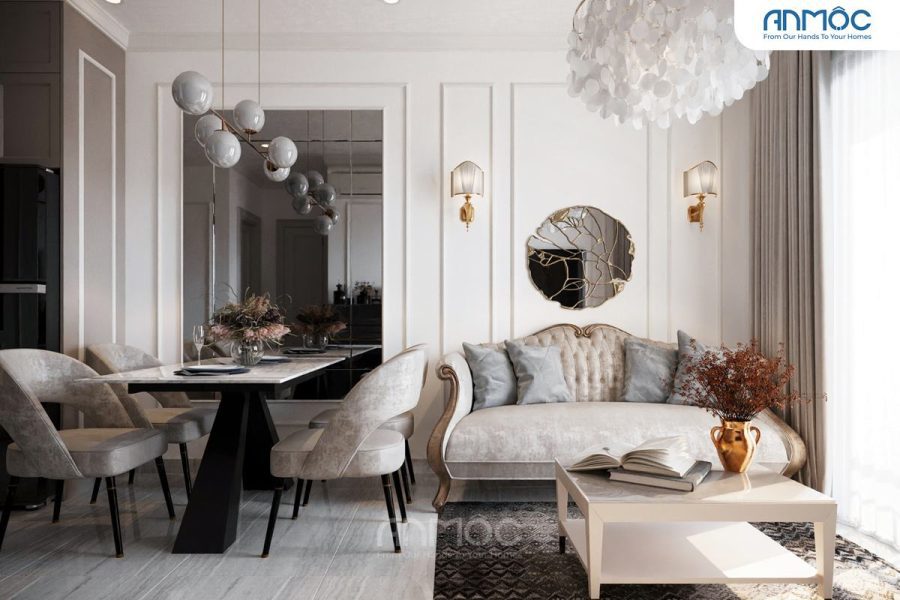 Phòng khách với sofa kiểu dáng cổ điển, bên cạnh là bàn ăn với ghế bọc nệm