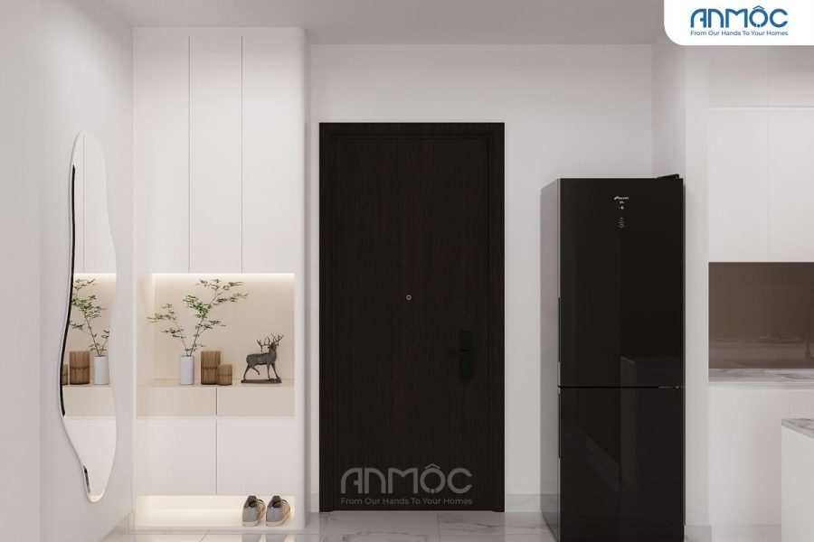 Khu vực sảnh chung cư Diamond Riverside 75m2 với tủ giày âm tường trắng, gương soi độc đáo