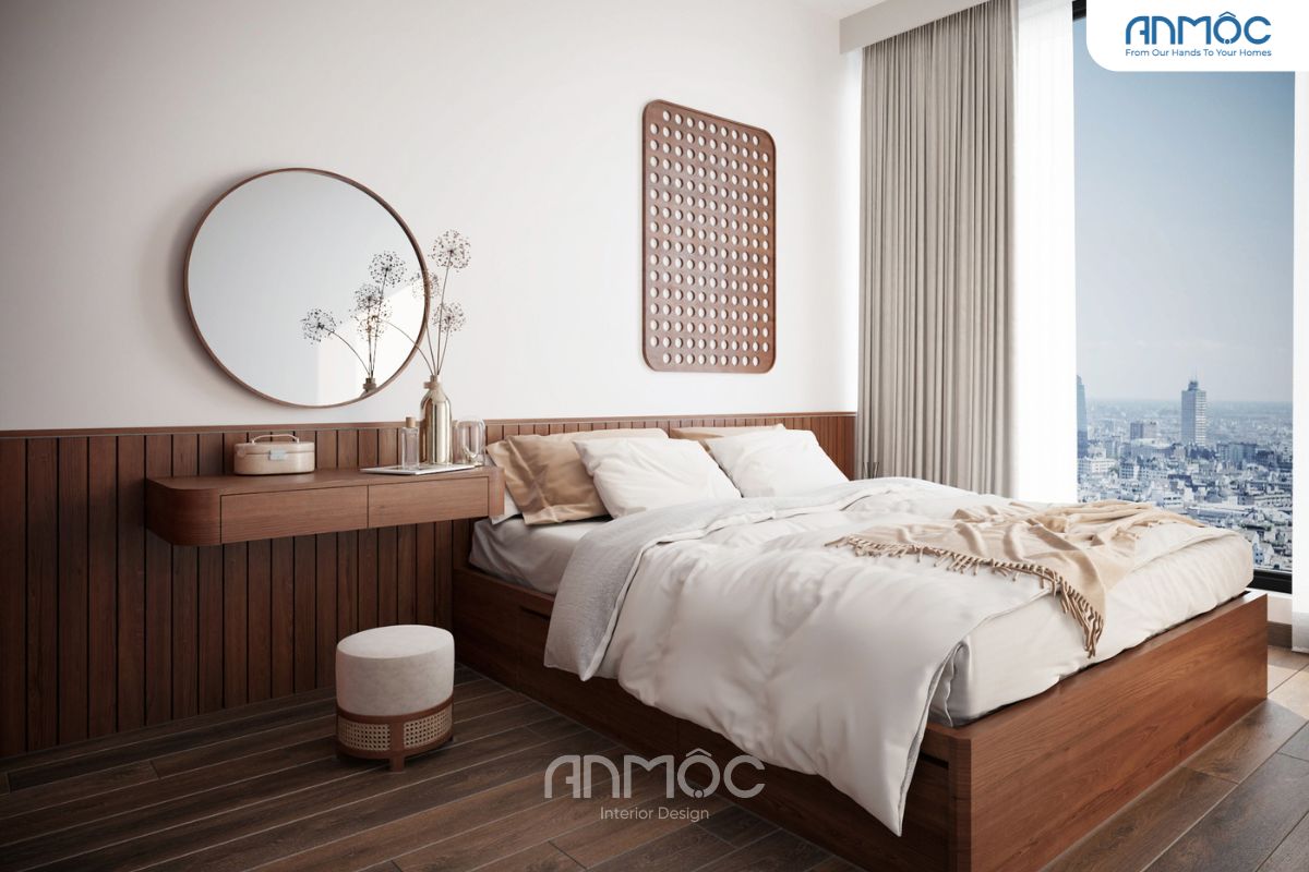 Bàn trang điểm treo tường bằng gỗ mộc mạc với gương tròn không bóng bẩy. Bình hoa gốm thô với cành khô, tượng trưng cho sự trôi chảy của thời gian.
