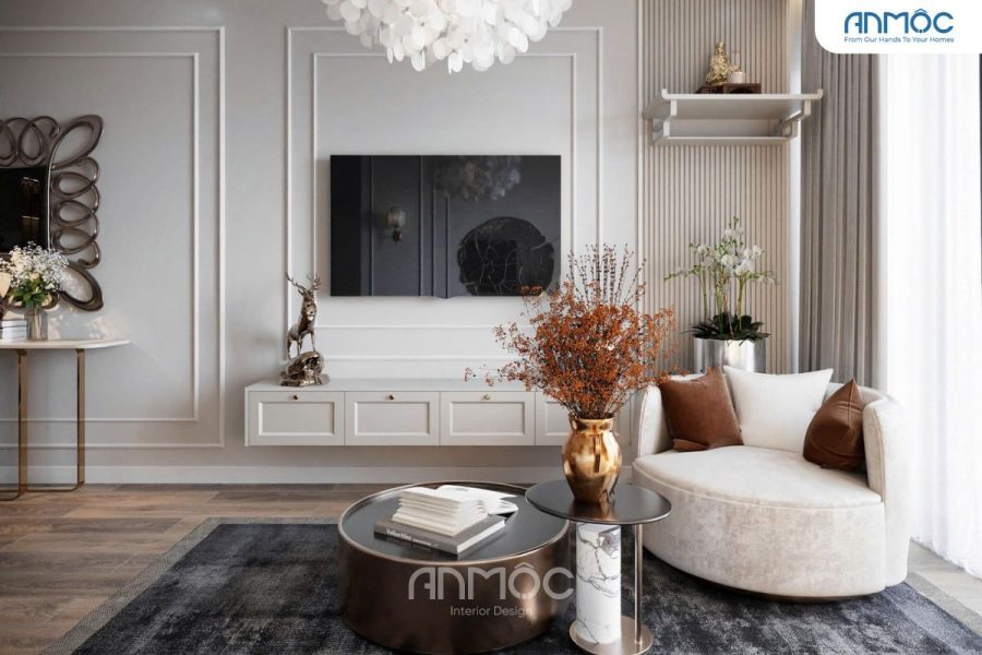 Kệ tivi treo tường, sofa chữ L mềm mại và điểm nhấn là bình hoa nghệ thuật.