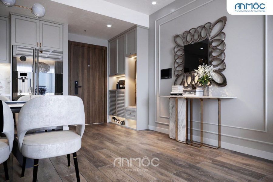 Không gian sảnh vào tinh tế với điểm nhấn gương nghệ thuật và bàn console đá sang trọng.