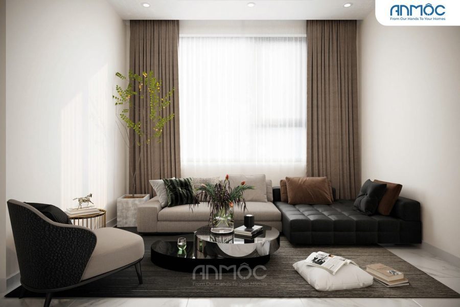 Phòng sinh hoạt chung phong cách Indochine với bộ sofa màu be và đen, bàn trà tròn bóng loáng, và rèm cửa màu nâu đất