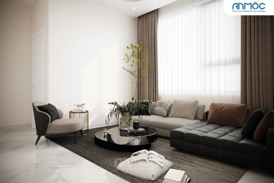 Góc nhìn rộng hơn của phòng sinh hoạt chung, thảm trải sàn màu tối và ánh sáng tự nhiên từ cửa sổ lớn.