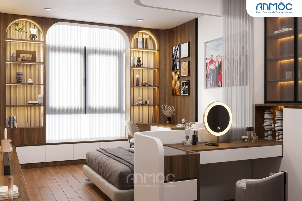 Cận cảnh khu vực bàn trang điểm hiện đại với gương tròn có đèn và ghế đôn, nằm cạnh hệ tủ kệ âm tường