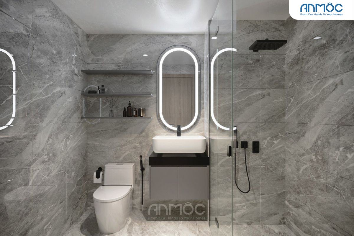 Phòng tắm hiện đại với tường ốp đá marble, gương oval đèn LED, lavabo đặt nổi và vòi sen đen
