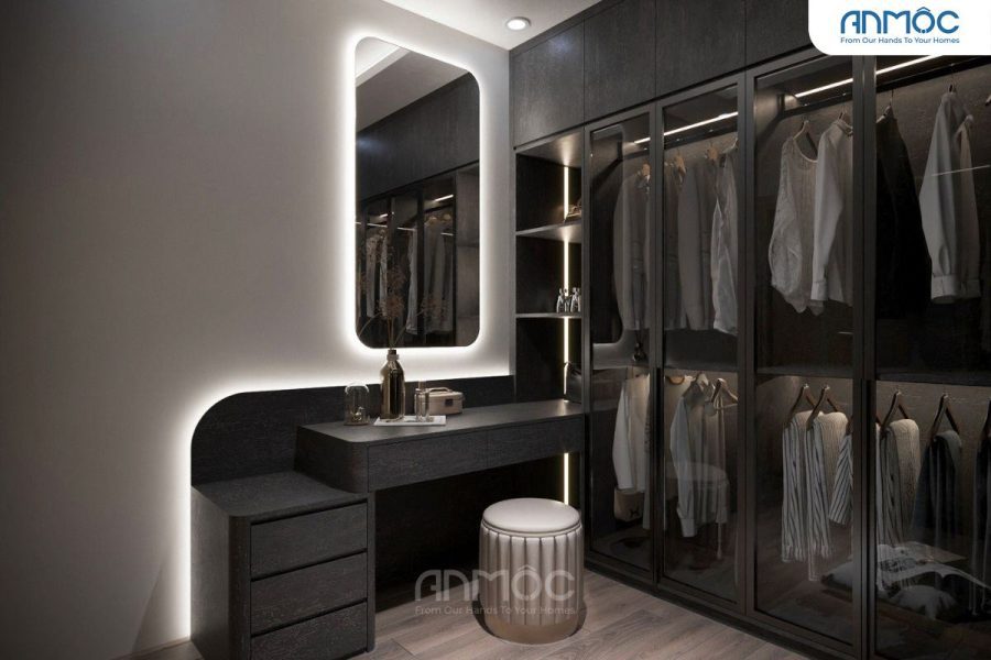 Góc trang điểm tích hợp trong phòng thay đồ, bàn vanity đen, gương đèn LED và ghế đôn tròn hiện đại