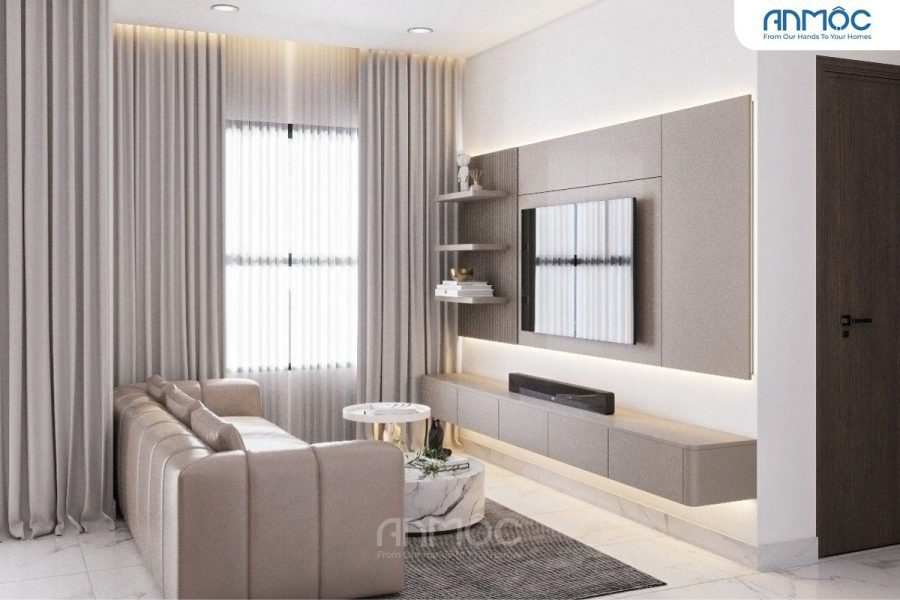 Phòng khách nhìn từ sofa, thể hiện không gian mở liên thông với phòng ăn, nổi bật sofa be và bàn trà tròn hiện đại