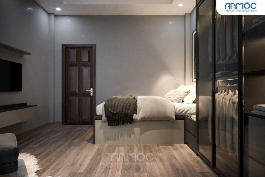 Cận cảnh giường ngủ và cửa ra vào, cho thấy cách bố trí tối ưu không gian nhỏ hẹp của phòng ngủ