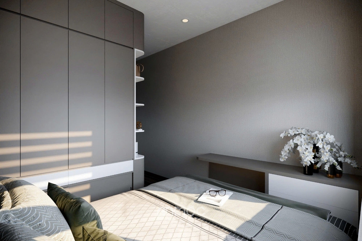 Cận cảnh tủ quần áo màu xám sang trọng, cùng với lọ hoa trắng trên bàn trang điểm, tạo điểm nhấn mềm mại cho phòng ngủ_An Mộc