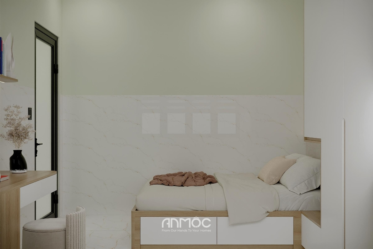 Góc phòng ngủ được bố trí gọn gàng với giường hộp tích hợp hộc lưu trữ và nội thất tối giản