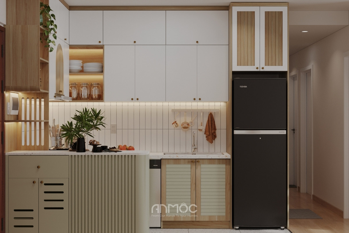 Hệ tủ bếp chữ L kết hợp bàn đảo đa năng giúp tối ưu diện tích lưu trữ và mang lại không gian bếp gọn gàng, tiện nghi_An Mộc