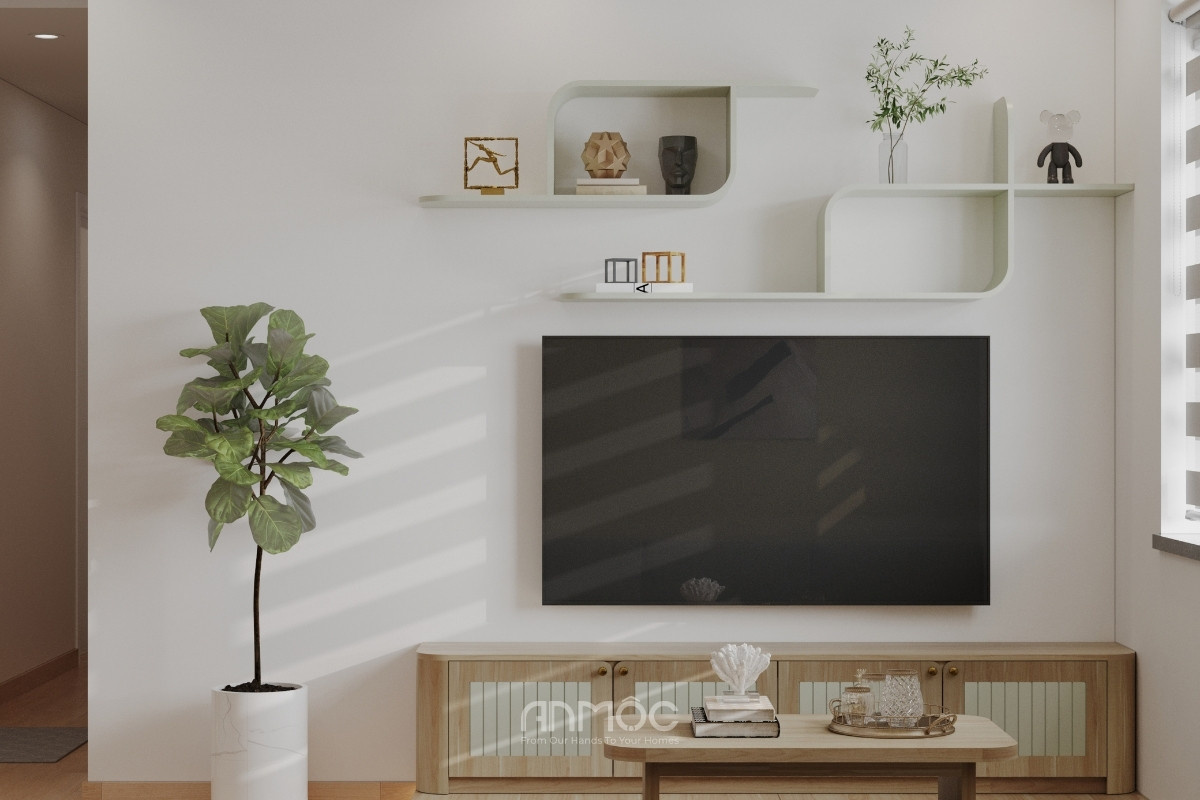 Kệ tủ tivi gỗ gọn gàng tạo cảm giác ấm cúng và hiện đại cho phòng khách chung cư Topaz Home 67m2_An Mộc