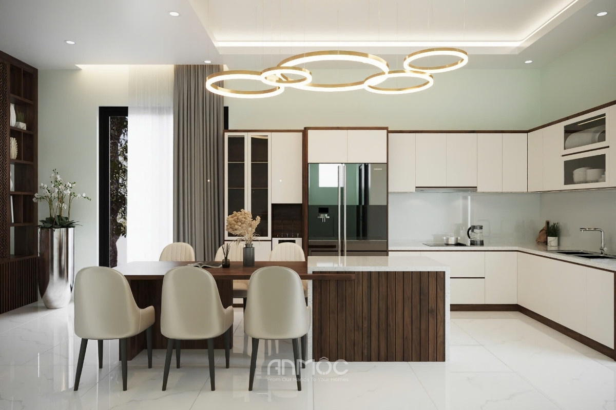 Không gian bếp được bố trí hiện đại với đảo bếp kết hợp bàn ăn, vừa tiện lợi trong sinh hoạt vừa tạo điểm nhấn thẩm mỹ