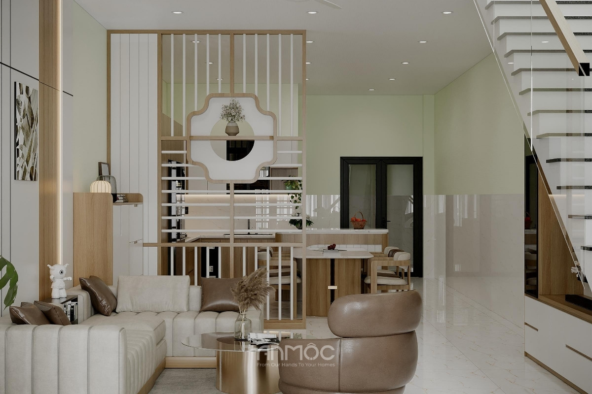 Không gian phòng khách nhà phố Hóc Môn 80m2 kết nối với khu vực bếp phía sau và sử dụng vách lam tạo sự phân tách nhẹ nhàng