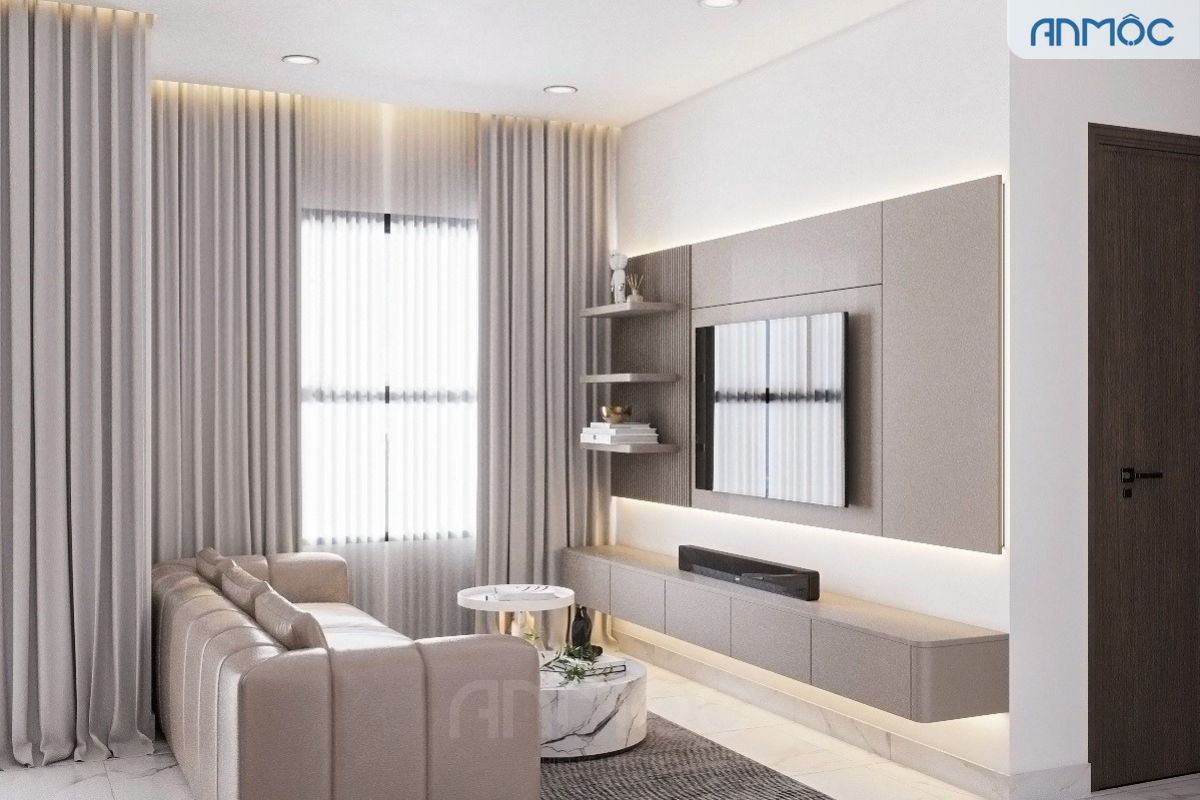 Phòng khách nhìn từ sofa, thể hiện không gian mở liên thông với phòng ăn, nổi bật sofa be và bàn trà tròn hiện đại