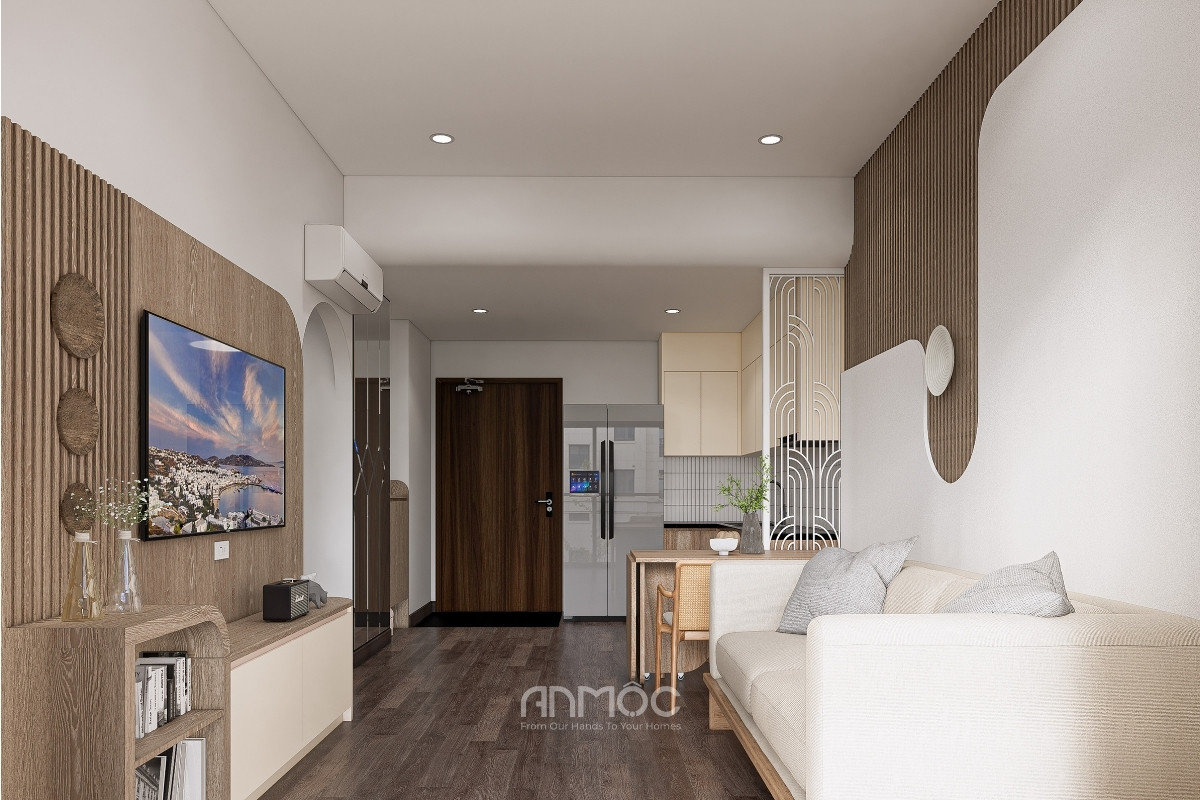 Phòng khách nhìn từ sofa về phía kệ TV treo, lối vào và khu vực bếp