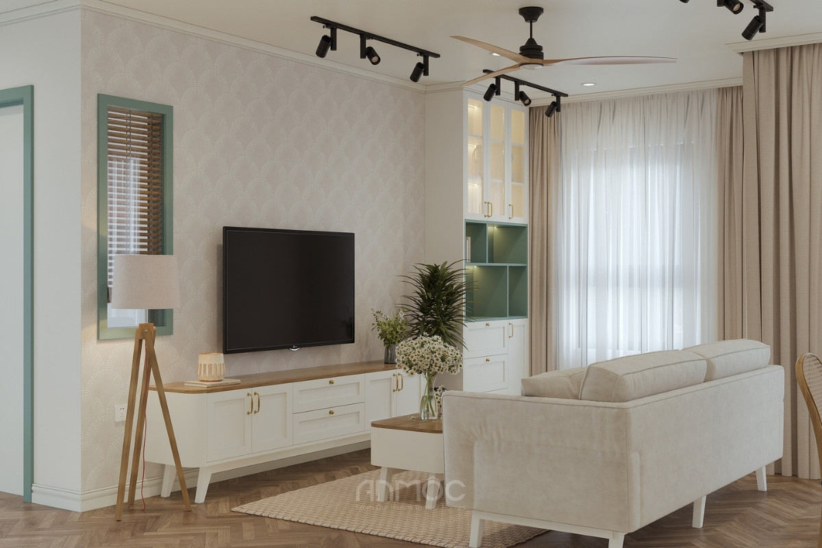 Phòng khách tươi sáng với sofa trắng, tivi, kệ gỗ và cây xanh