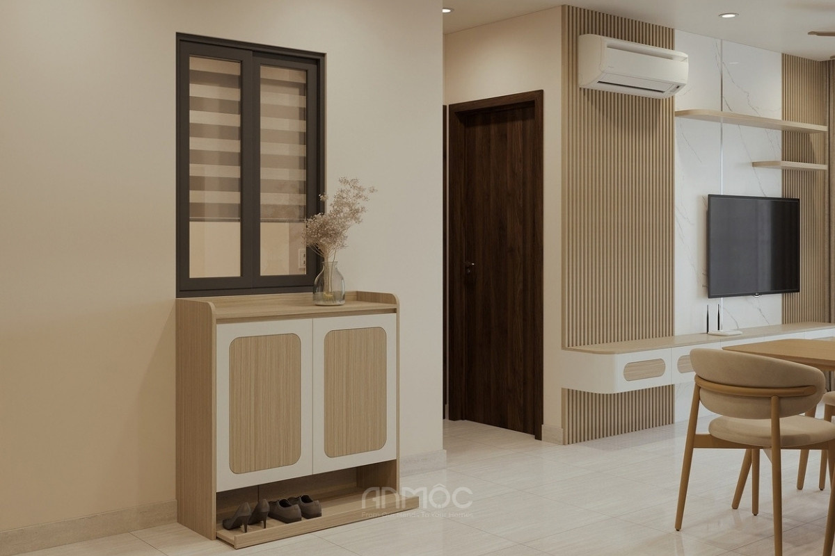 Chiếc tủ giày gỗ nhỏ gọn, hiện đại đặt ngay khu vực ra vào trong nhà